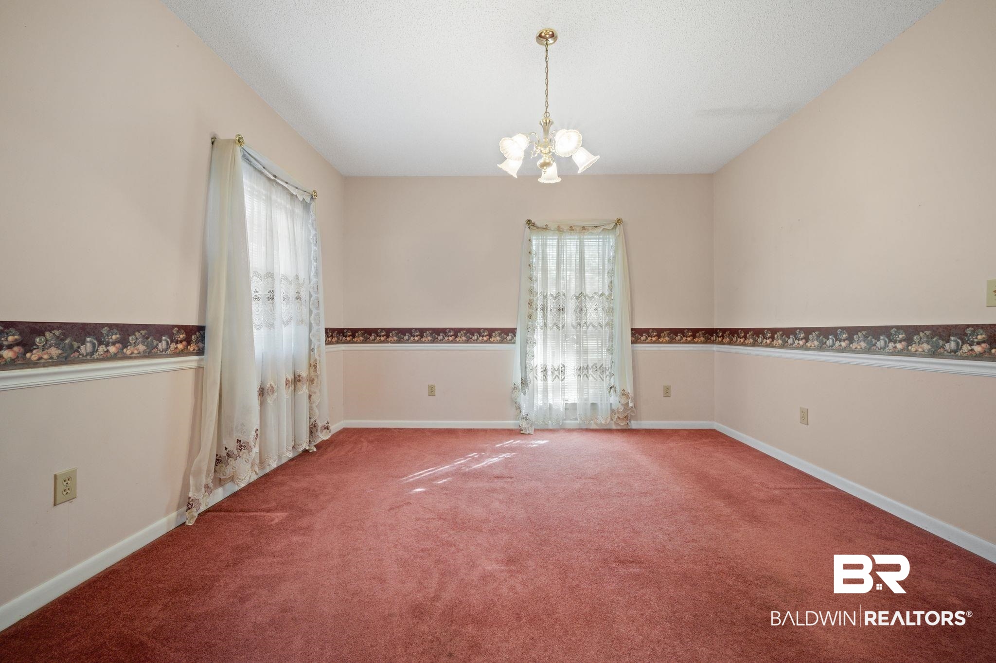 15801 Maytower Road Bay Minette, AL 36507 - Photo 21 of 43 Carpeted spare room featuring a chandelier