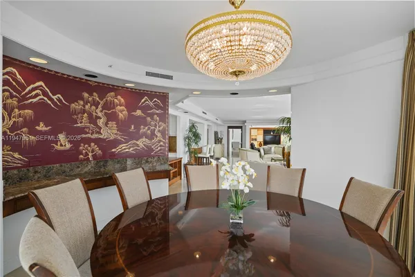 a view of livingroom and dining room with furniture