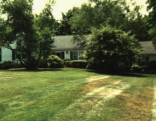 23 Cheese Spring Road Wilton, CT 06897 - Photo 1 of 1 a view of a swimming pool and lounge chairs