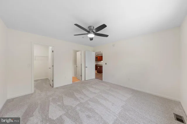 a view of a livingroom with a ceiling fan