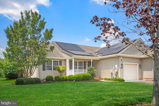 a view of a house with a garden