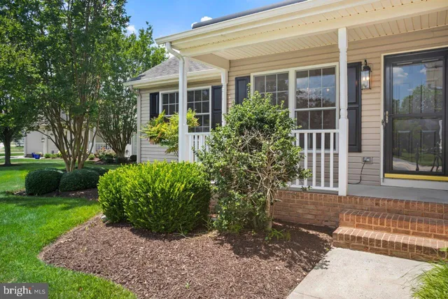 a view of a house with a garden