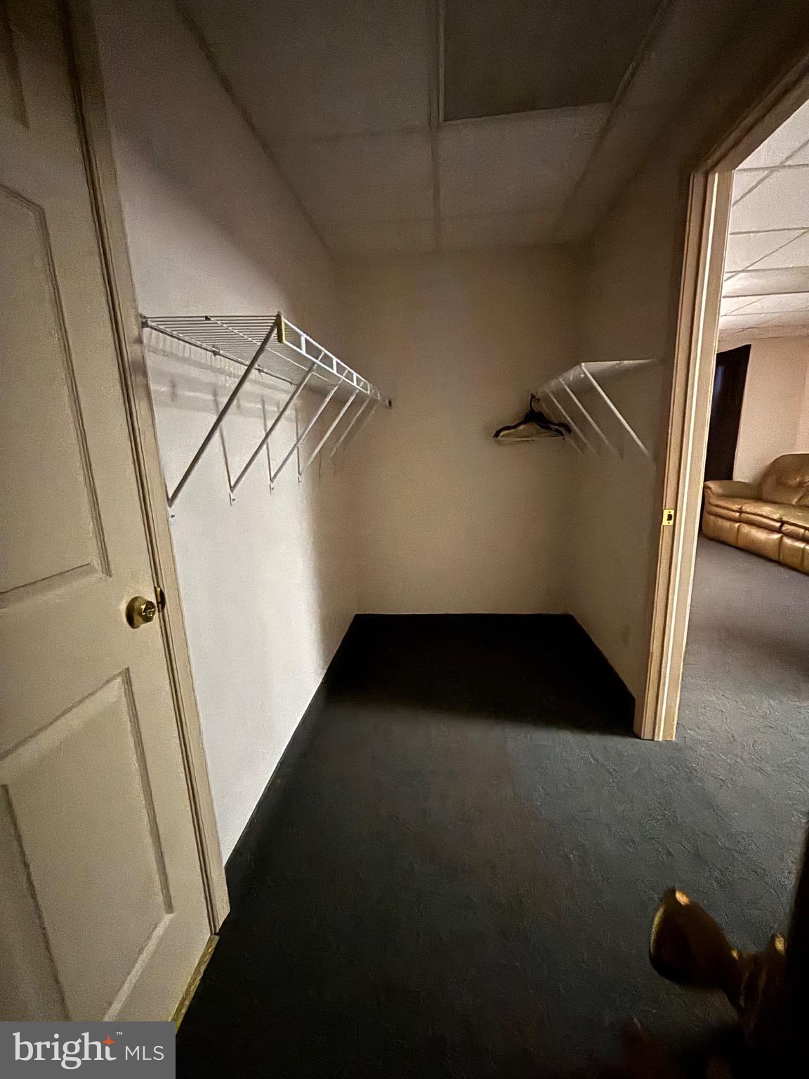 145 Main Street, Unit D Pennsburg, PA 18073 - Photo 3 of 8 a view of walk in closet with clothes and shoes