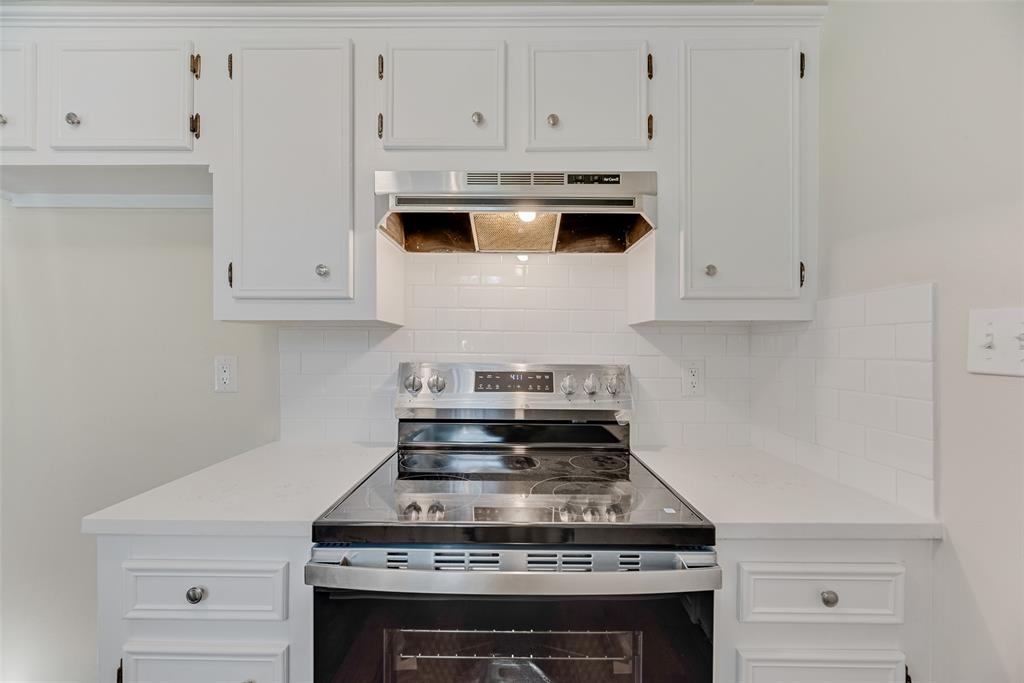 751 County Road 1240 Mount Pleasant, TX 75455 - Photo 19 of 35 a stove top oven sitting inside of a kitchen