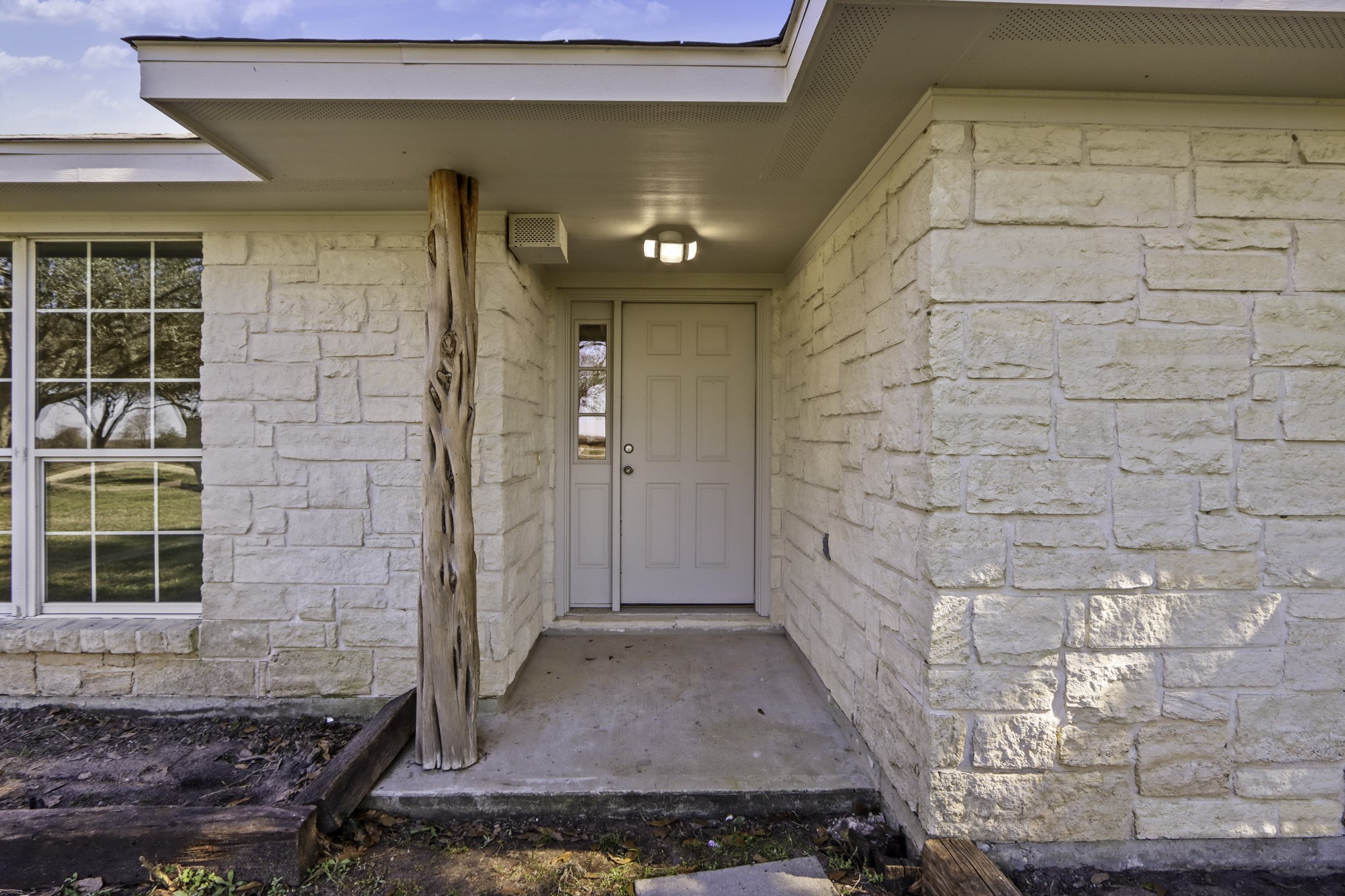 2445 Woods Road Brookshire, TX 77423 - Photo 2 of 29 a view of a brick house with a brick wall