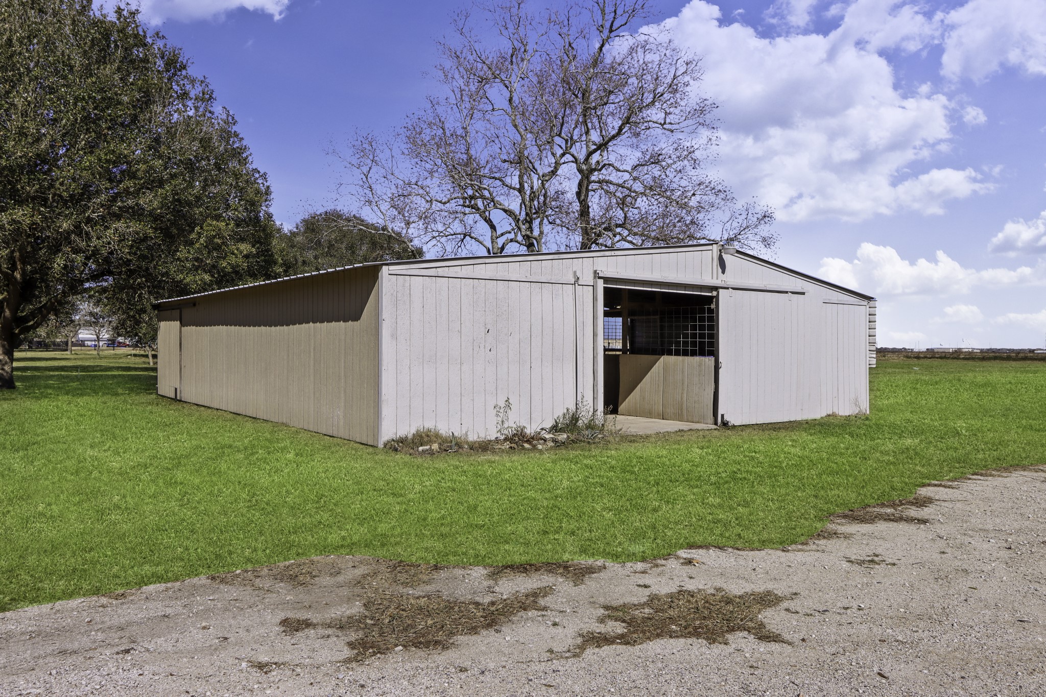 2445 Woods Road Brookshire, TX 77423 - Photo 26 of 29 a front view of house with garden and yard