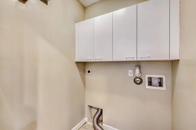 a view of storage and utility room with washer and dryer