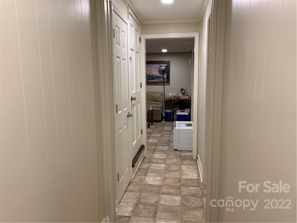 368 Hidden Hill Road Tryon, NC 28782 - Photo 19 of 19 a hallway with a view of bedroom