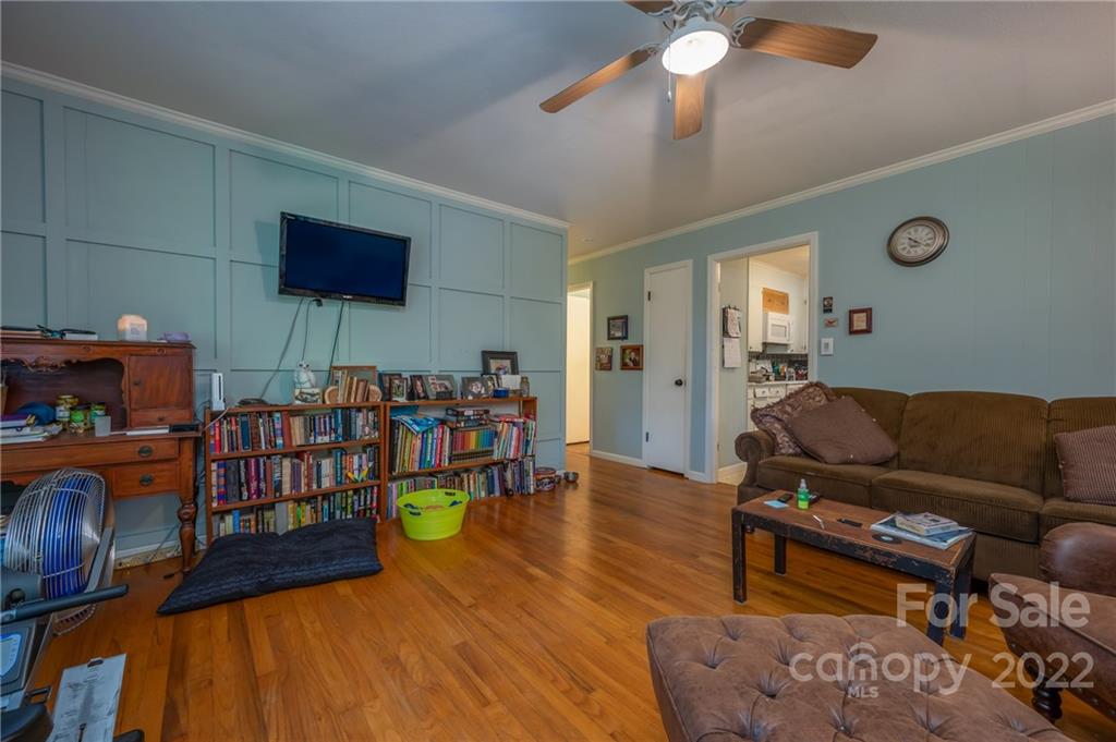 368 Hidden Hill Road Tryon, NC 28782 - Photo 6 of 19 a living room with furniture and a wooden floor
