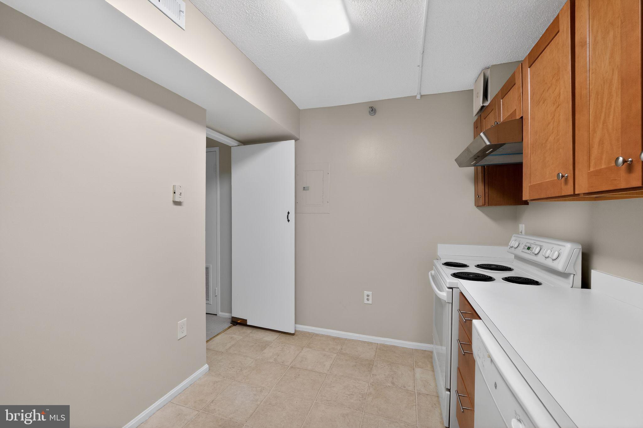 15107 Interlachen Drive, Unit 21022 Silver Spring, MD 20906 - Photo 13 of 33 a view of a storage & utility room with cabinets