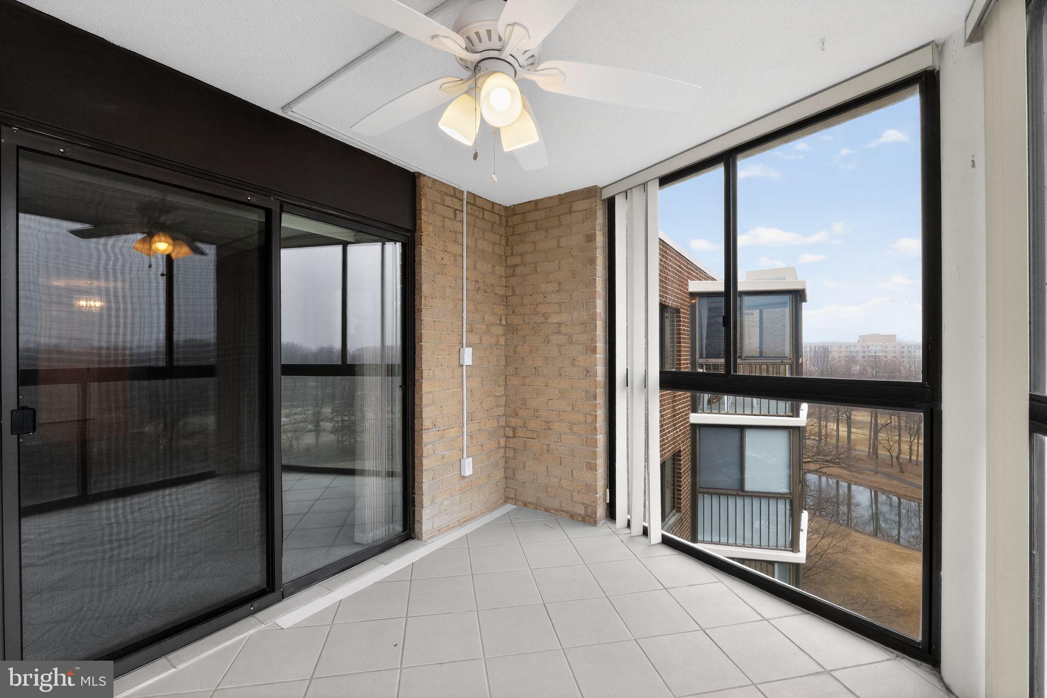 15107 Interlachen Drive, Unit 21022 Silver Spring, MD 20906 - Photo 20 of 33 a view of a hallway with a living room
