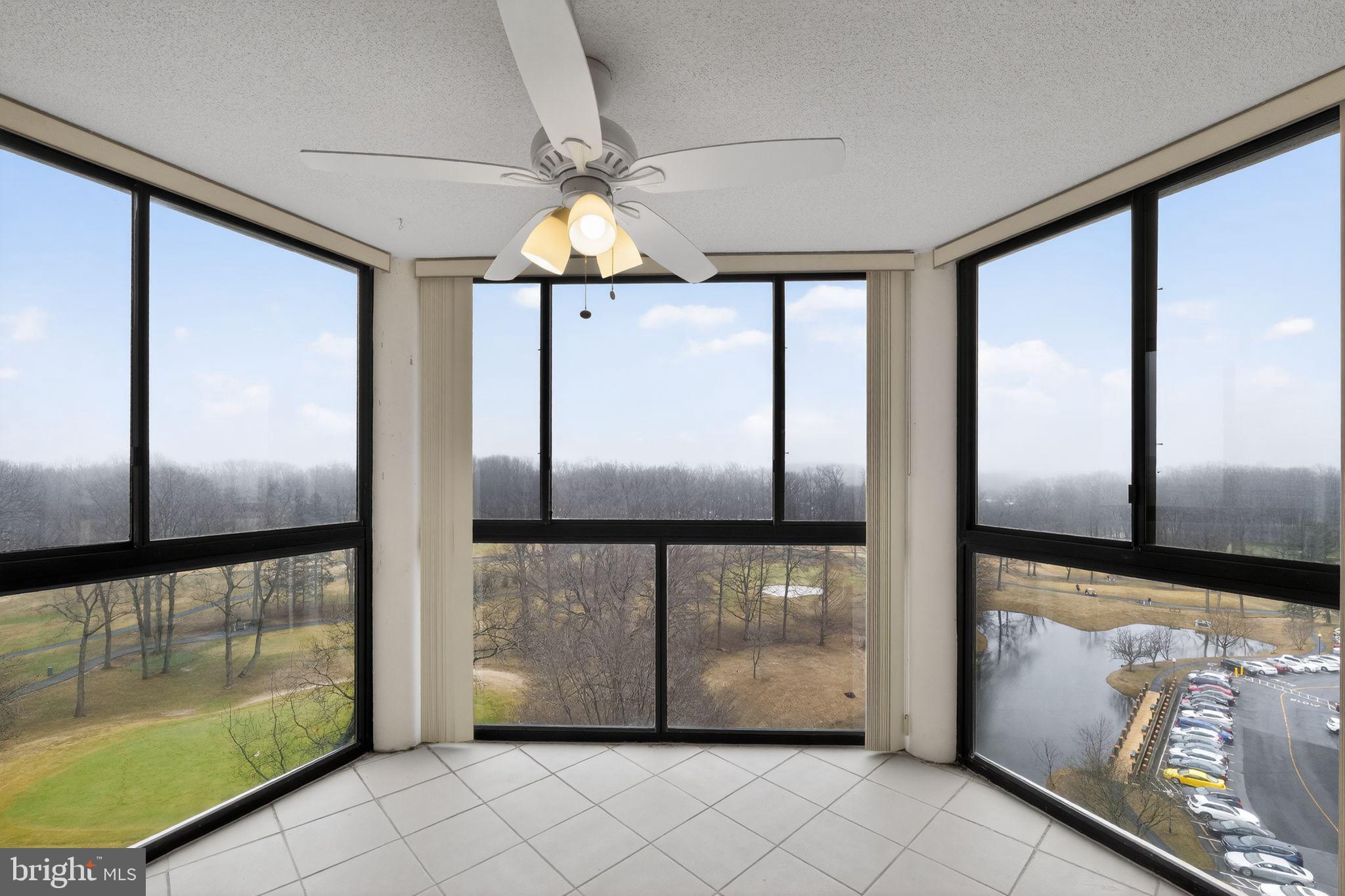 15107 Interlachen Drive, Unit 21022 Silver Spring, MD 20906 - Photo 21 of 33 a view of a refrigerator in kitchen and an empty room