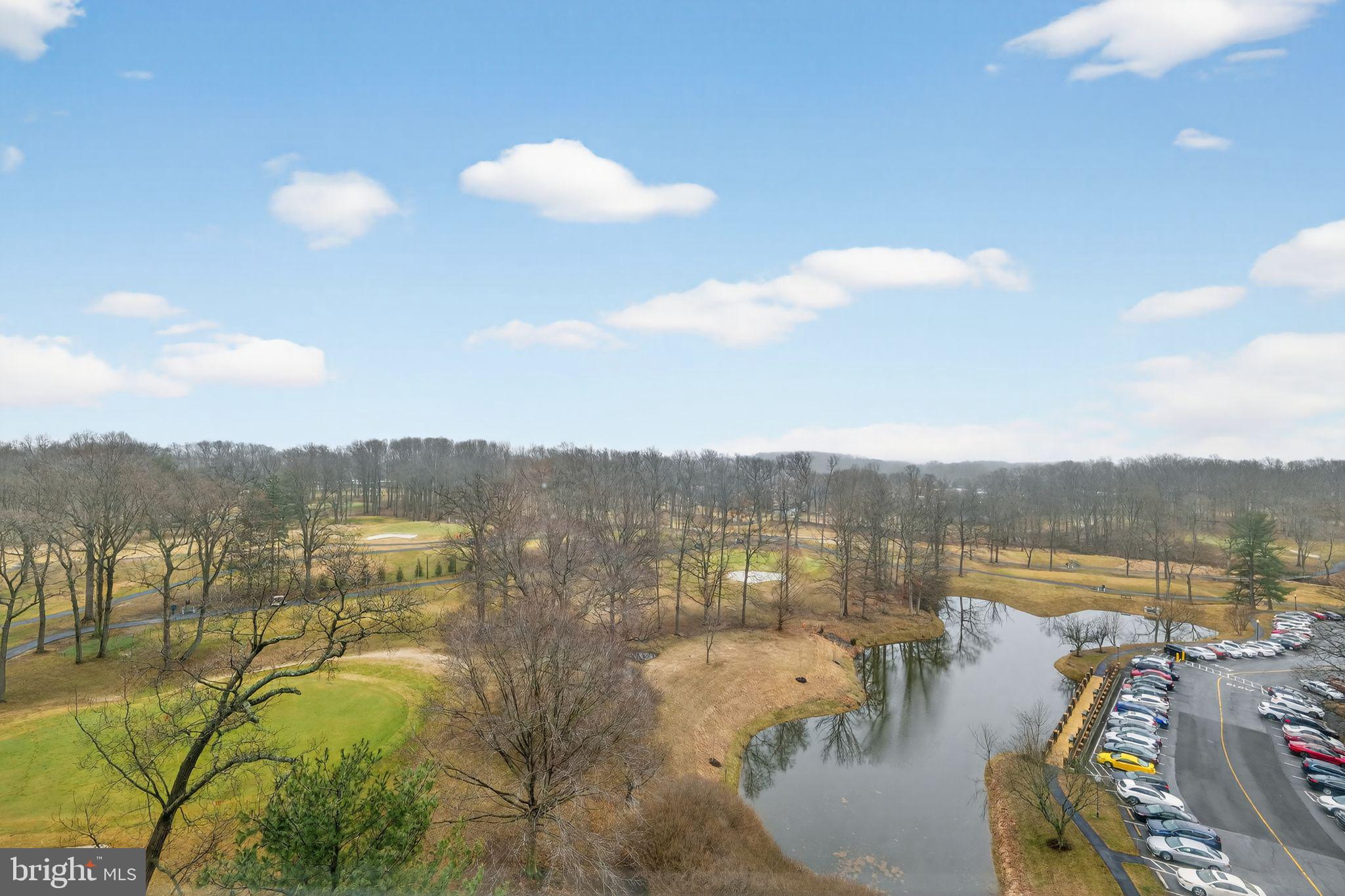 15107 Interlachen Drive, Unit 21022 Silver Spring, MD 20906 - Photo 31 of 33 a view of a lake in middle of the city