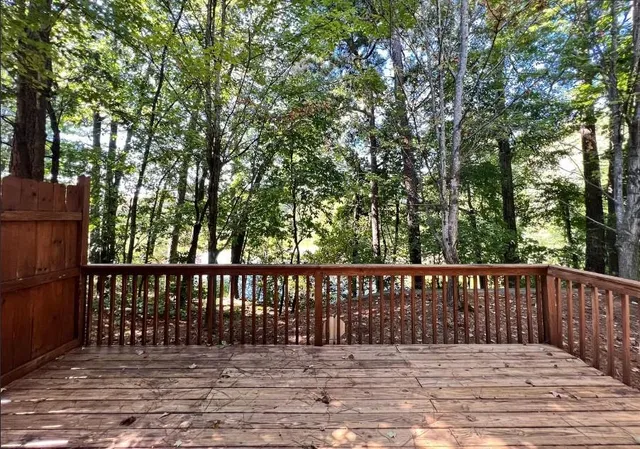 a wooden deck with a trees