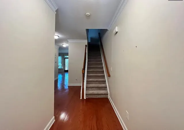 a view of entryway with wooden floor