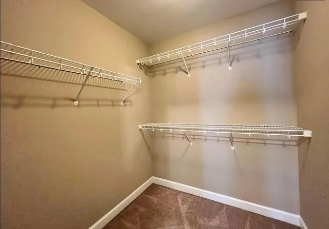 a view of a room with racks on the wall