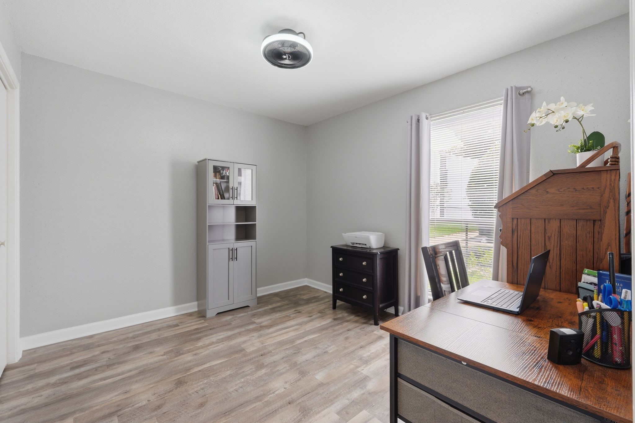 13151 Walden Road, Unit 131 Montgomery, TX 77356 - Photo 13 of 35 Versatile bedroom with abundant natural light and flexible living space.