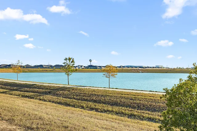 a view of an ocean and city