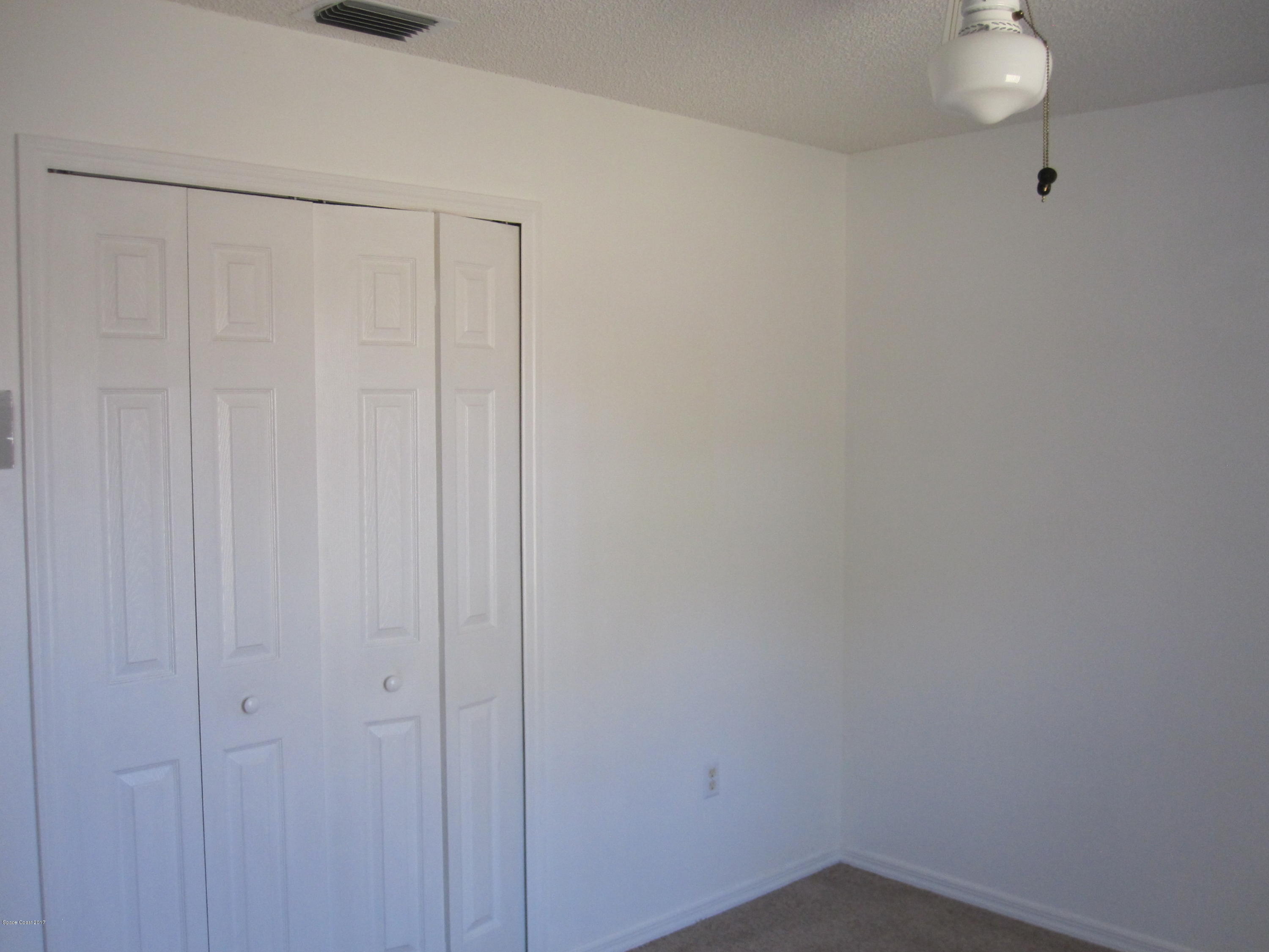 171 Americana Boulevard Northeast Palm Bay, FL 32907 - Photo 11 of 17 a small space with a window