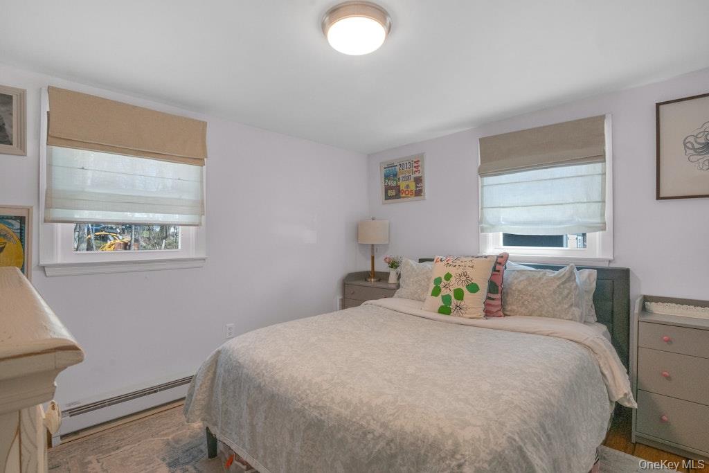 10 Locust Road Brewster, NY 10509 - Photo 7 of 21 a bedroom with a bed and window