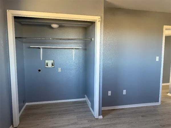 an empty room with closet