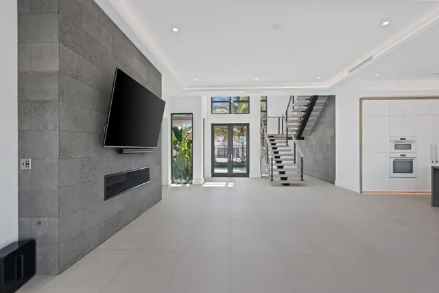 a view of a chairs and table in a patio