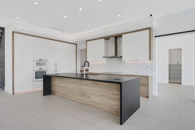 a view of backyard with potted plants