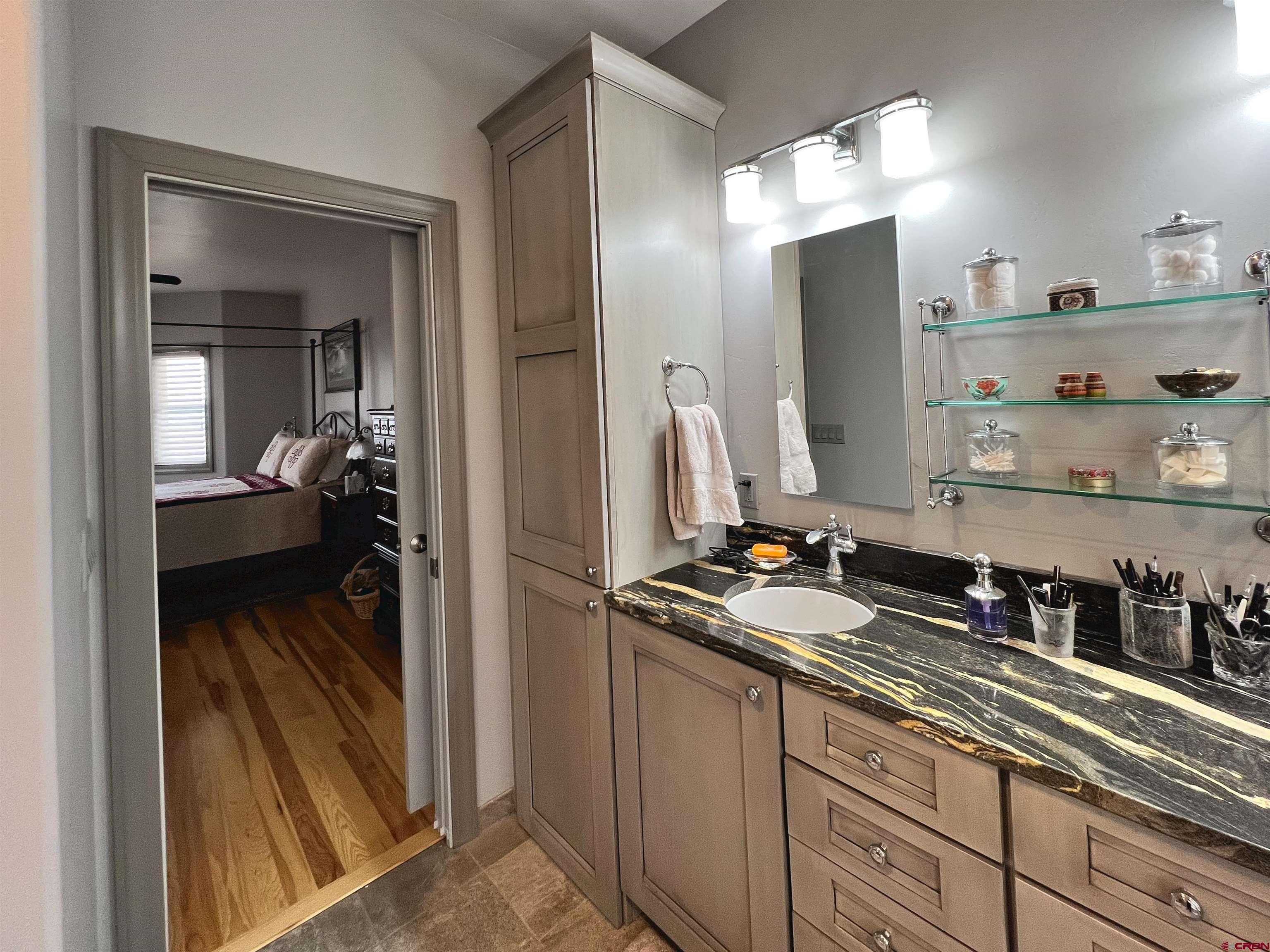 25286 Rd T.5 Dolores, CO 81323 - Photo 27 of 44 a kitchen with a refrigerator and a sink
