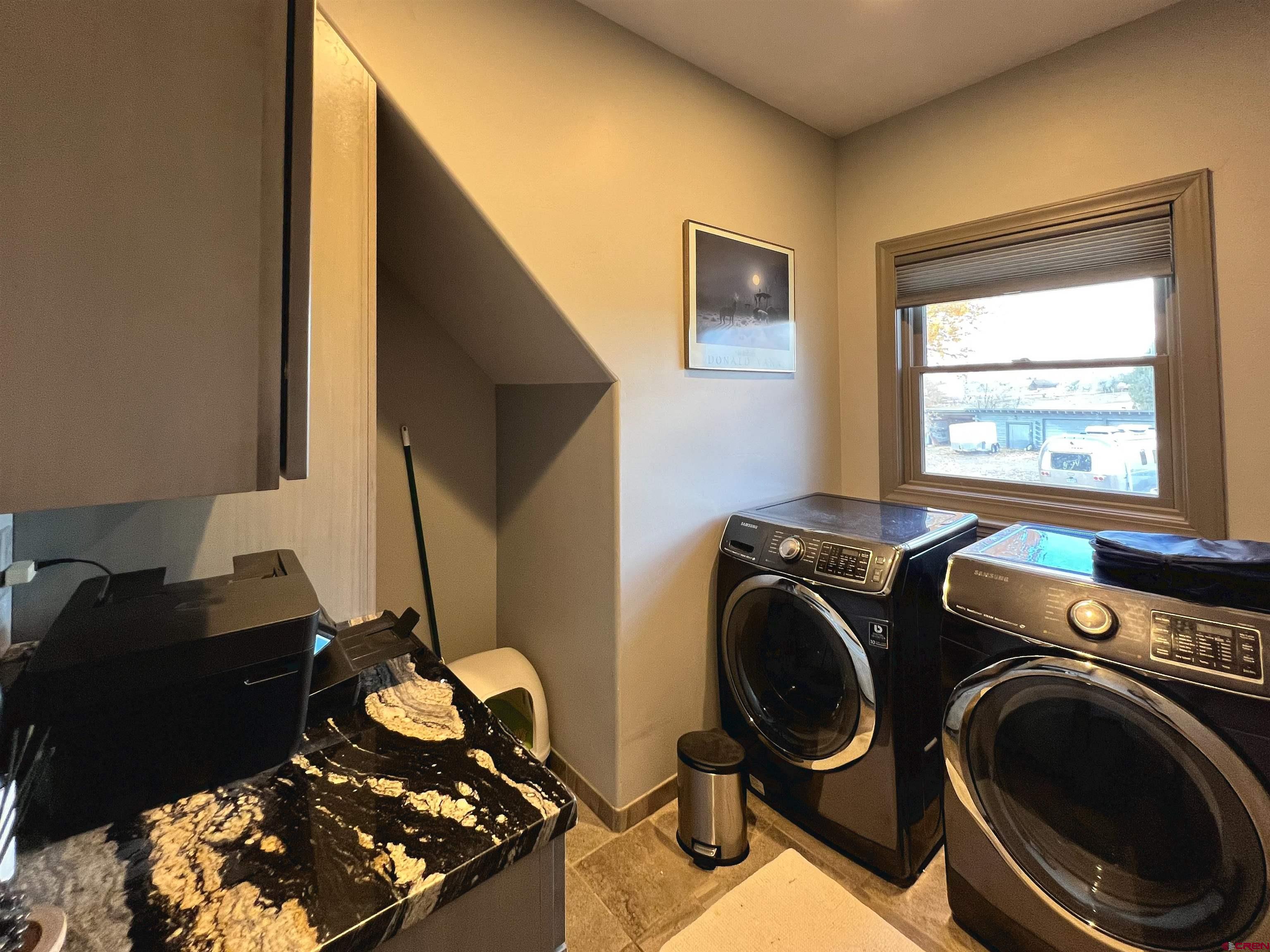 25286 Rd T.5 Dolores, CO 81323 - Photo 35 of 44 a room with storage and utility