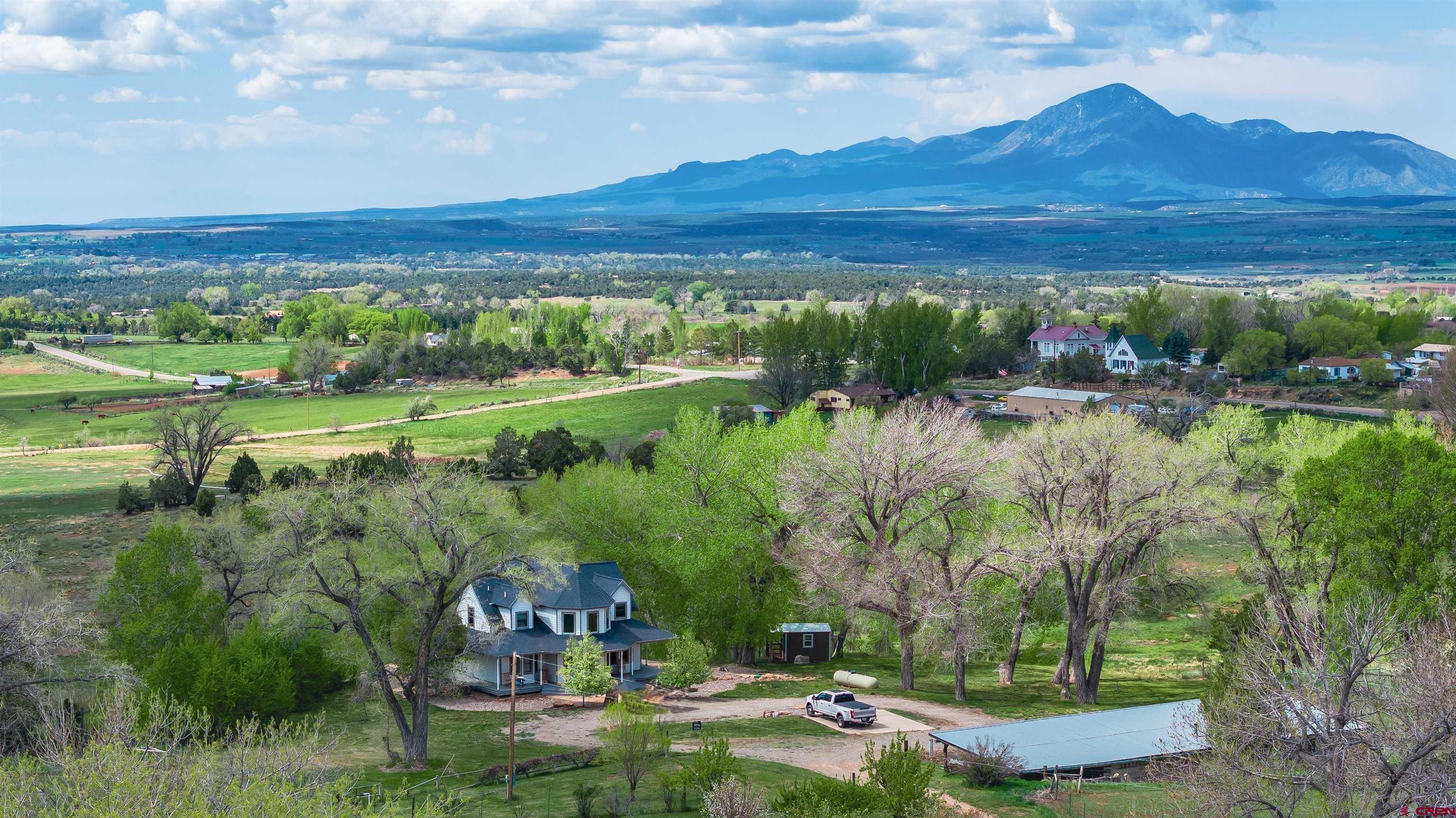25286 Rd T.5 Dolores, CO 81323 - Photo 6 of 44 a view of a lake with a mountain in the background