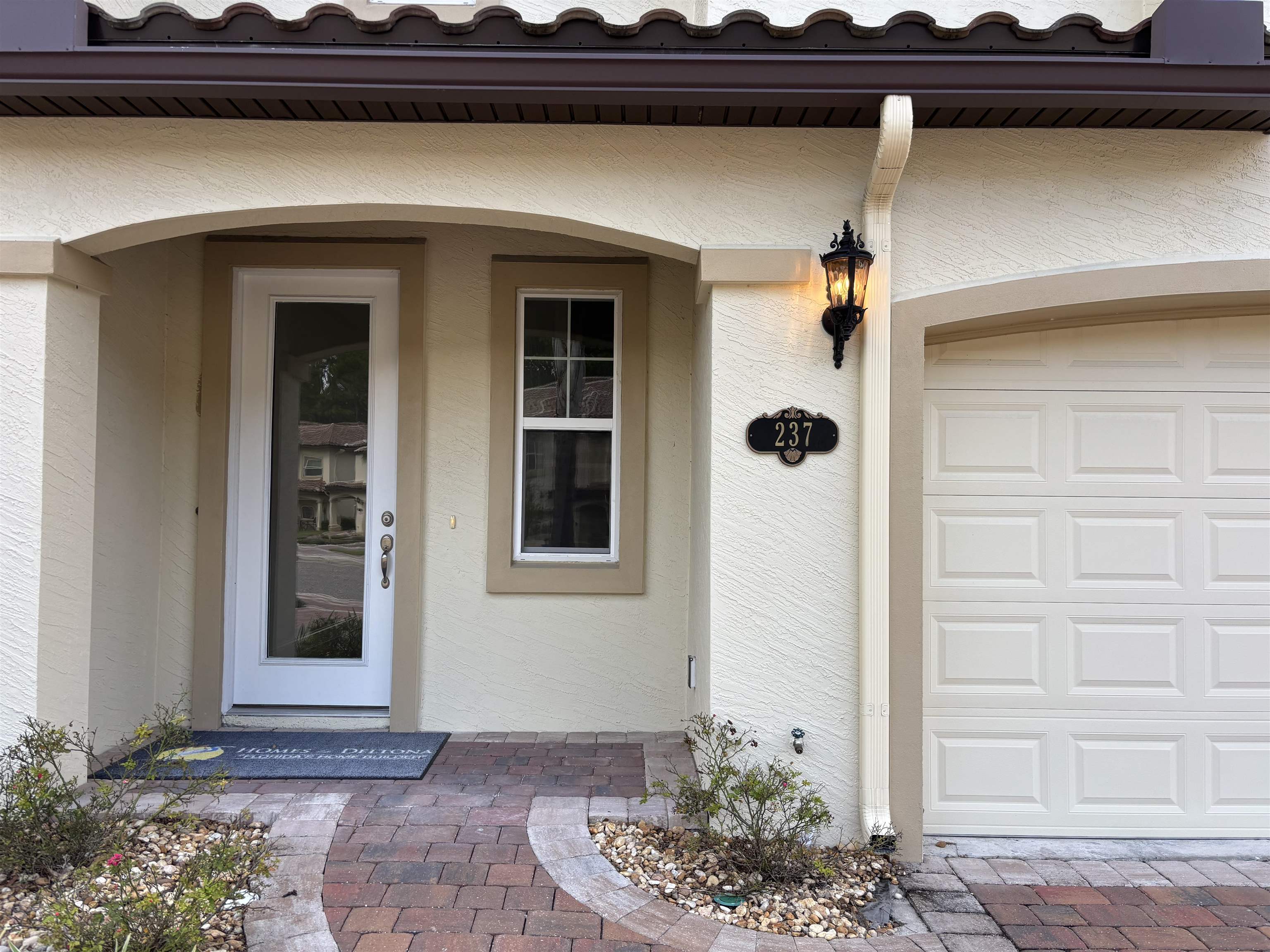 237 Grand Ravine Drive St. Augustine, FL 32086 - Photo 2 of 38 a view of a front door and a potted plant