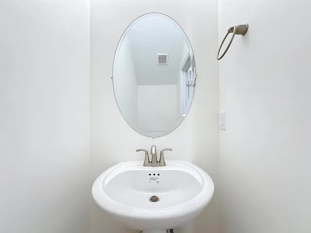 a view of a kitchen with furniture and a kitchen