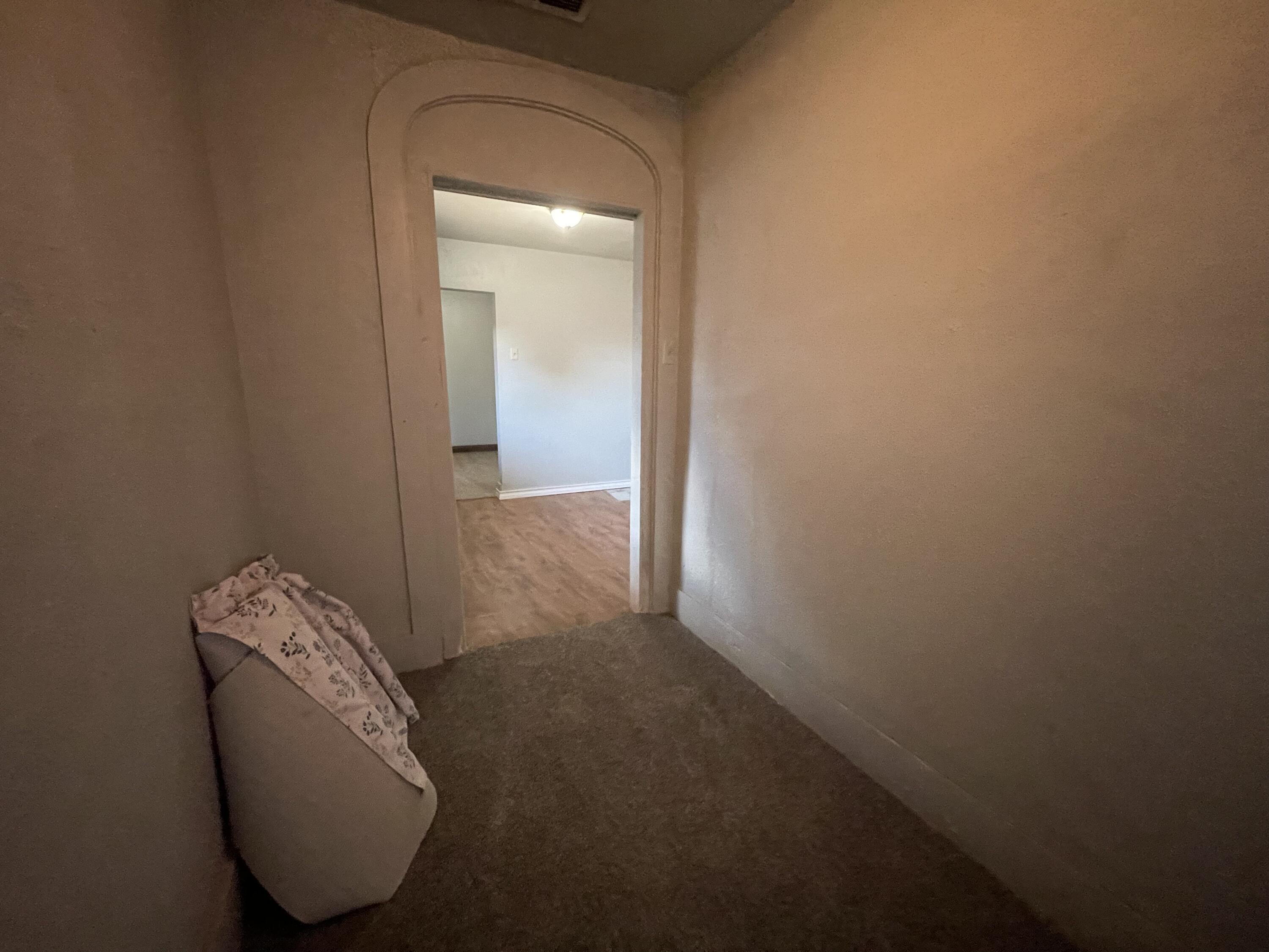 325 South 13th Street Slaton, TX 79364 - Photo 33 of 35 a view of a small space with racks on the wall