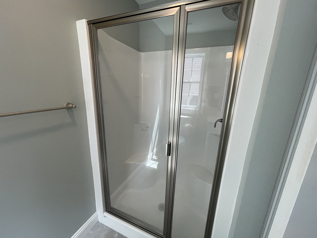 160 Canterbury Road Springfield, MA 01118 - Photo 13 of 20 a bathroom with a glass shower door and sink