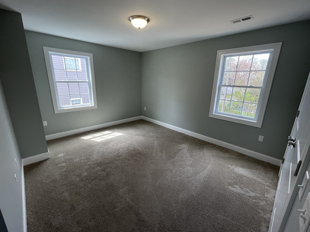 160 Canterbury Road Springfield, MA 01118 - Photo 14 of 20 an empty room with a window
