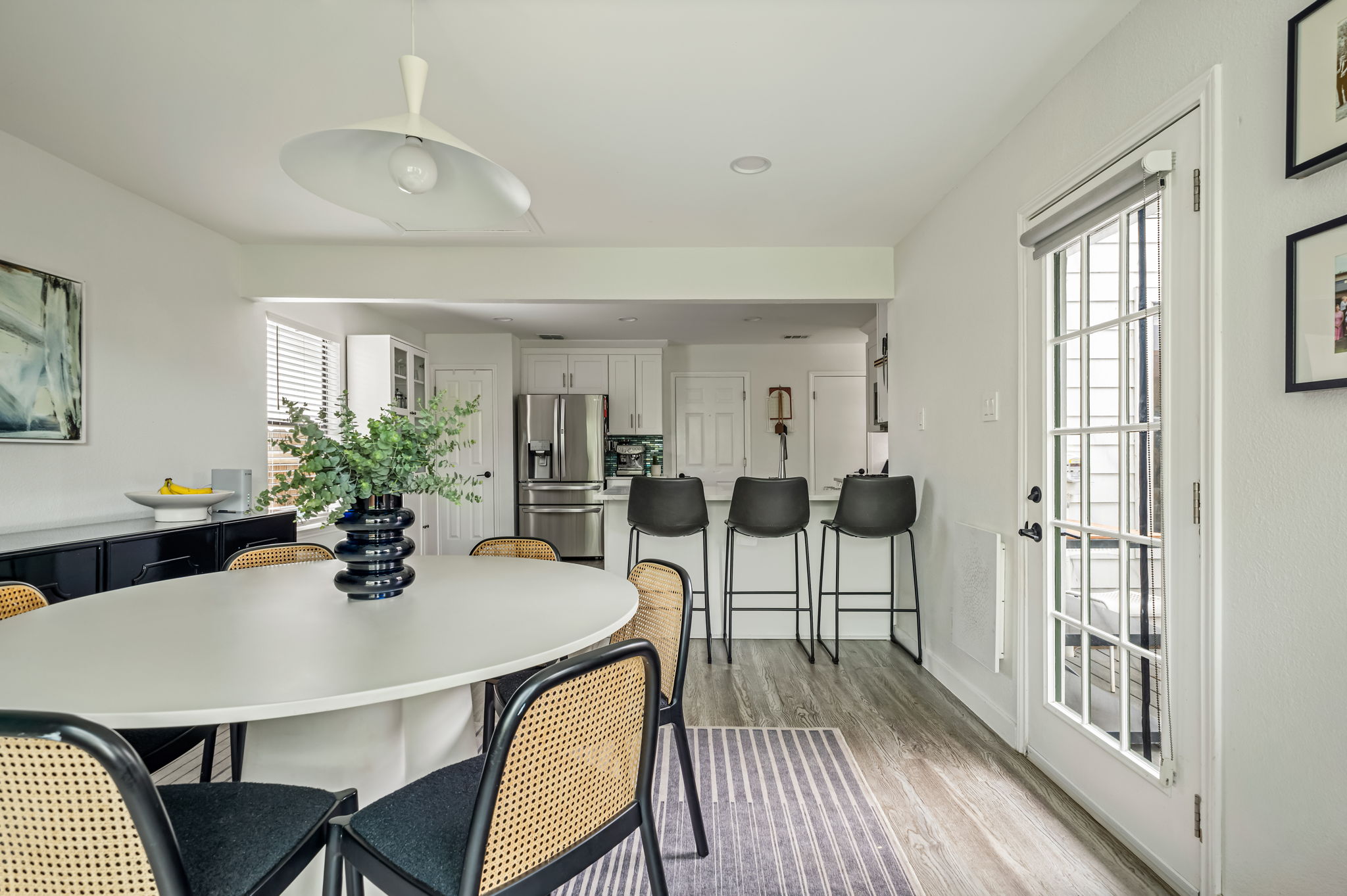 4506 Velasco Place Austin, TX 78749 - Photo 14 of 35 a view of a dining room with furniture and wooden floor