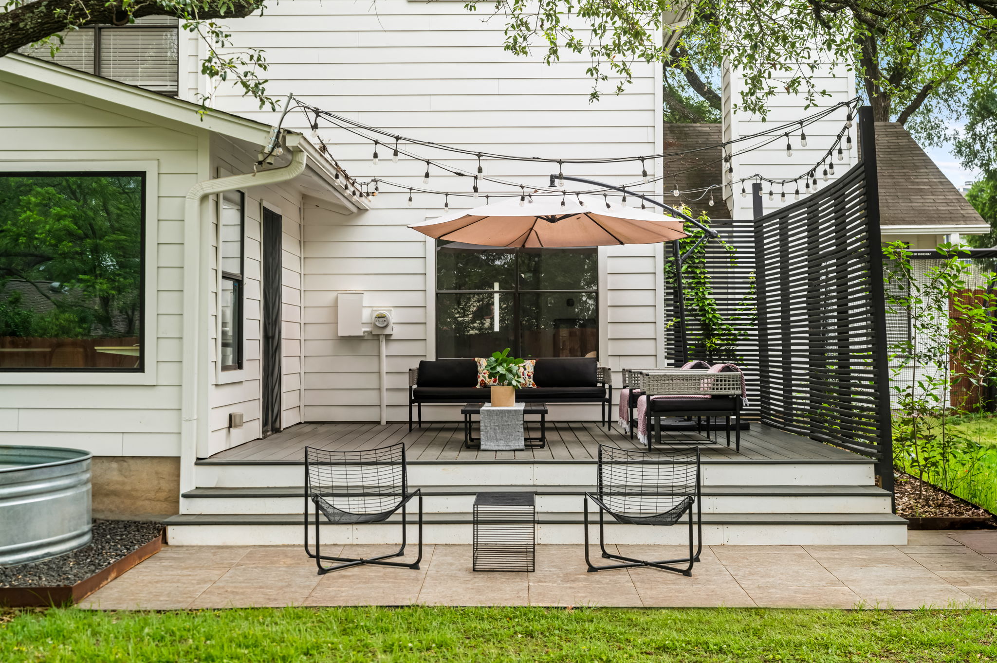 4506 Velasco Place Austin, TX 78749 - Photo 21 of 35 a view of a patio with couches chairs and a fire pit