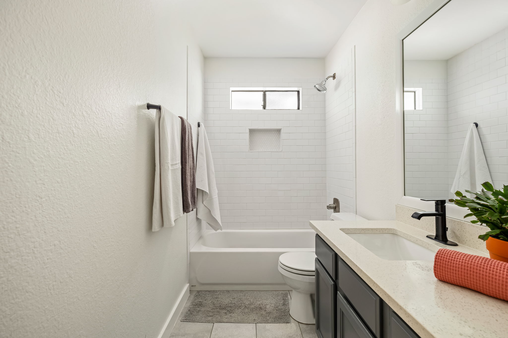 4506 Velasco Place Austin, TX 78749 - Photo 30 of 35 a bathroom with a sink a toilet and shower