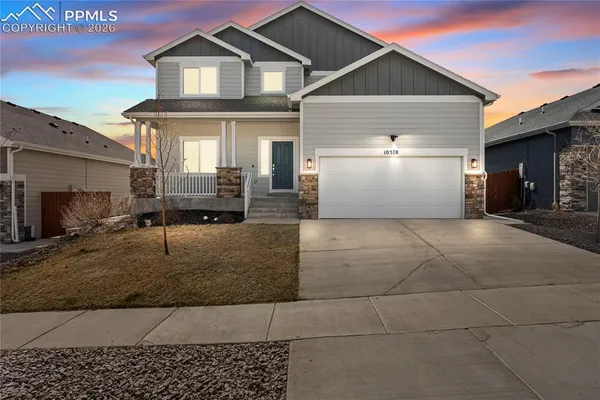 a view of a house with a garage