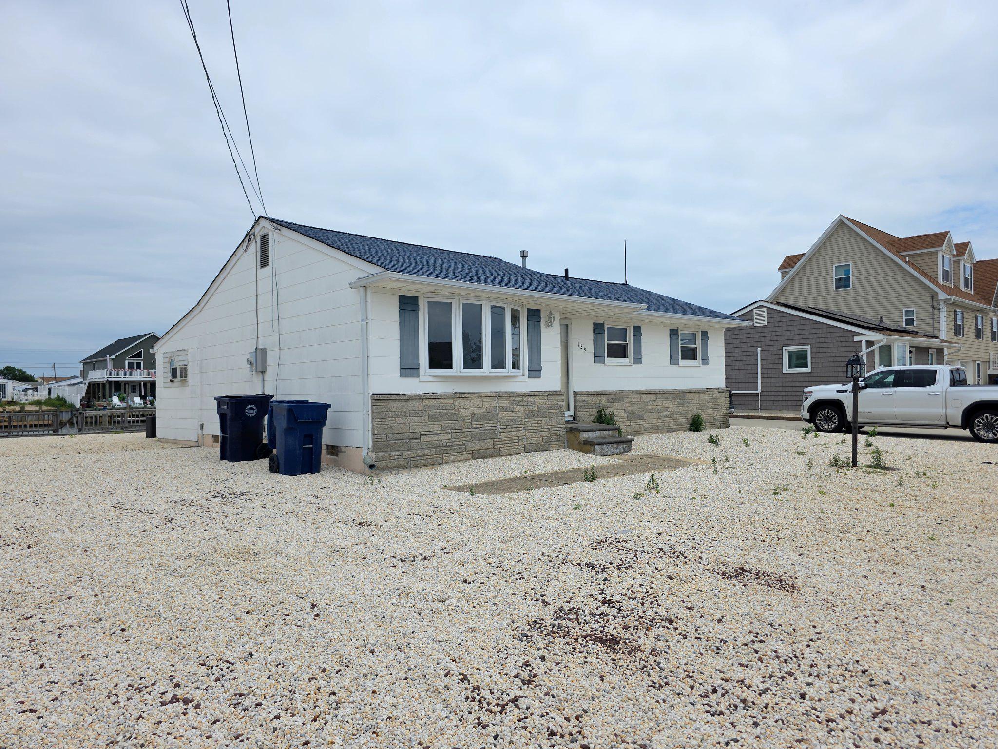 129 East Raritan Drive Tuckerton, NJ 08087 - Photo 2 of 17 Charming coastal retreat awaits you.