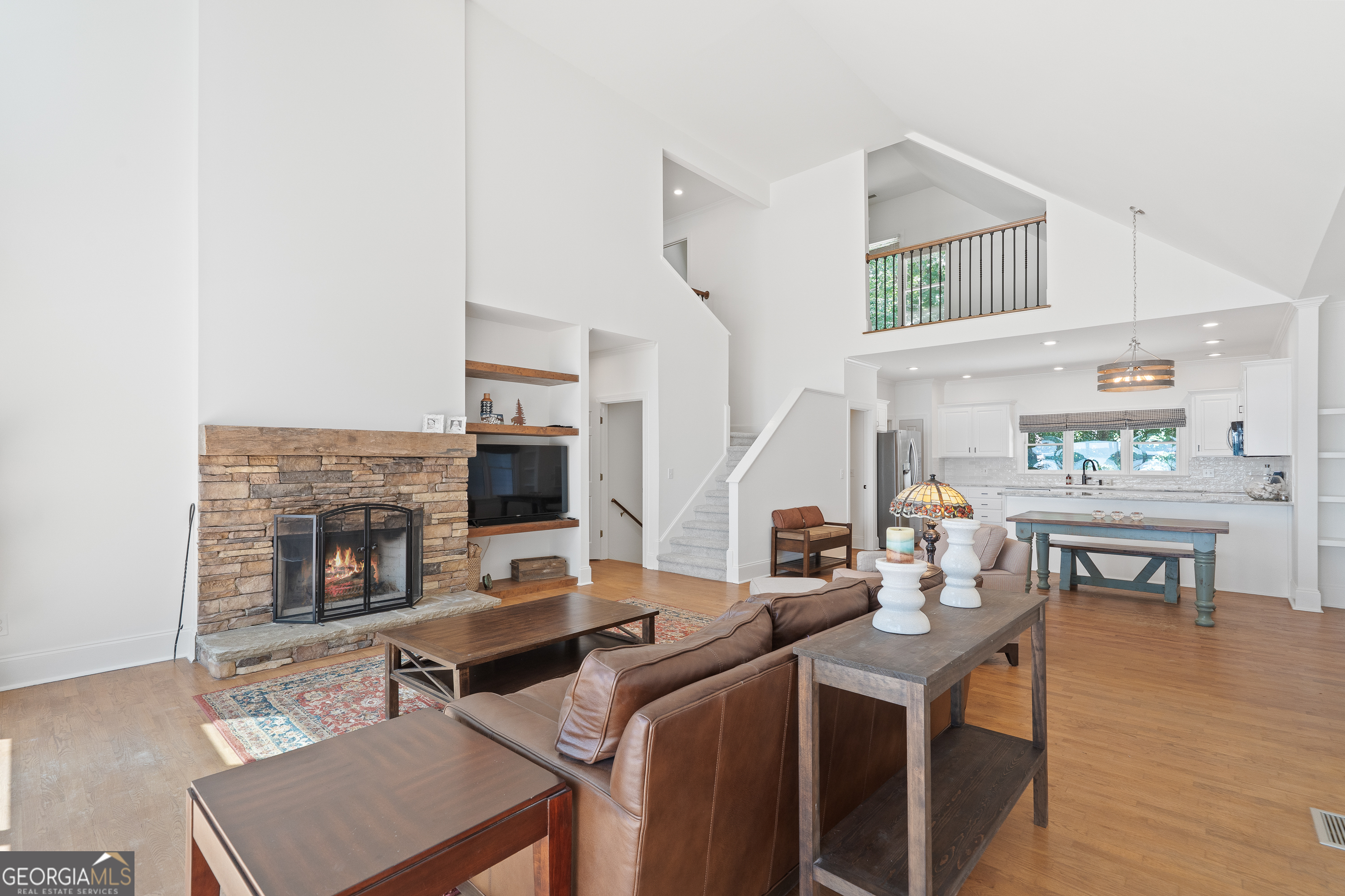 264 Winding River Road Eatonton, GA 31024 - Photo 13 of 72 a workspace with furniture and wooden floor