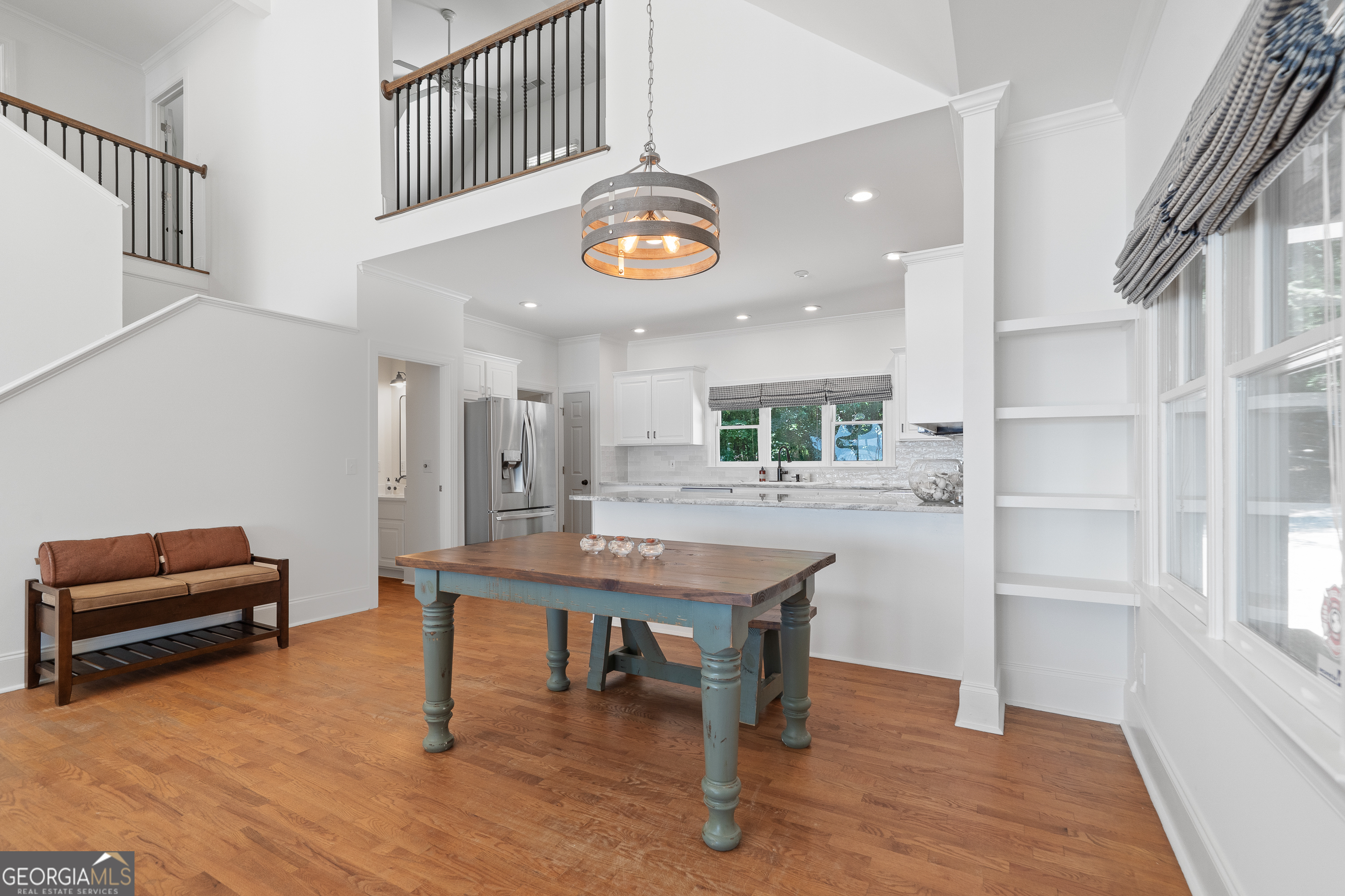264 Winding River Road Eatonton, GA 31024 - Photo 14 of 72 a view of a room with furniture and a window