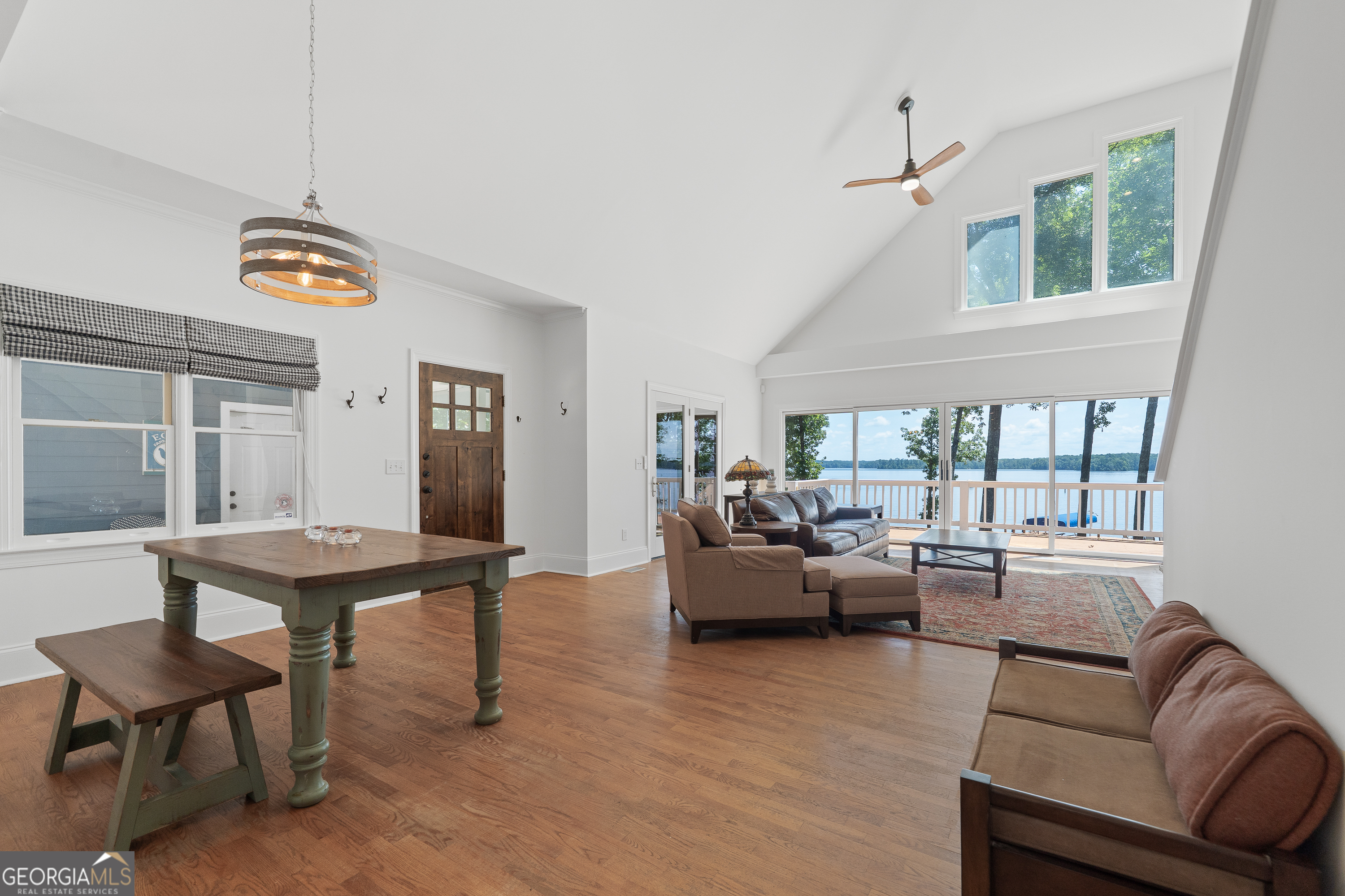 264 Winding River Road Eatonton, GA 31024 - Photo 15 of 72 a living room with furniture and a window