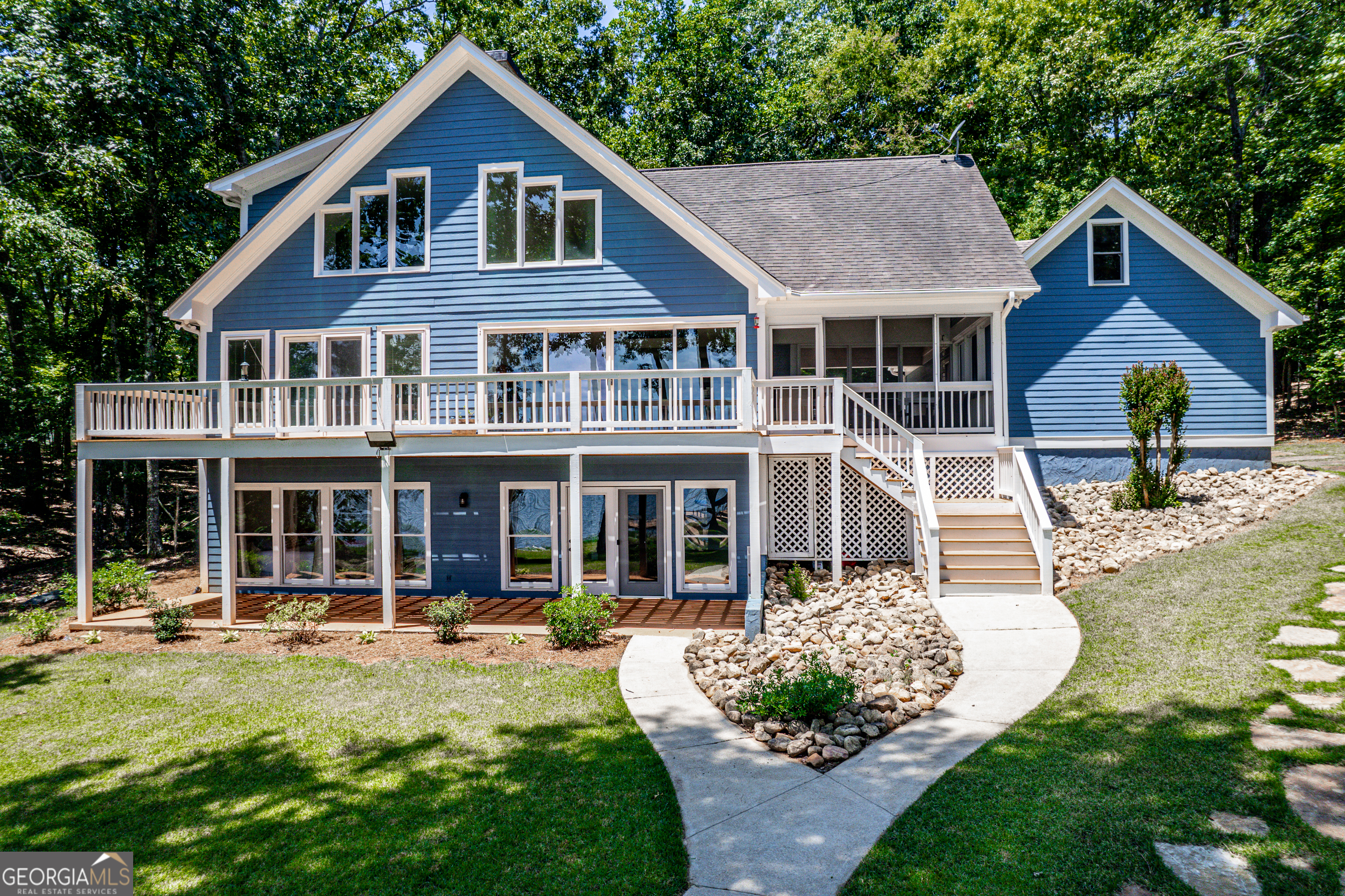 264 Winding River Road Eatonton, GA 31024 - Photo 60 of 72 a front view of a house with garden