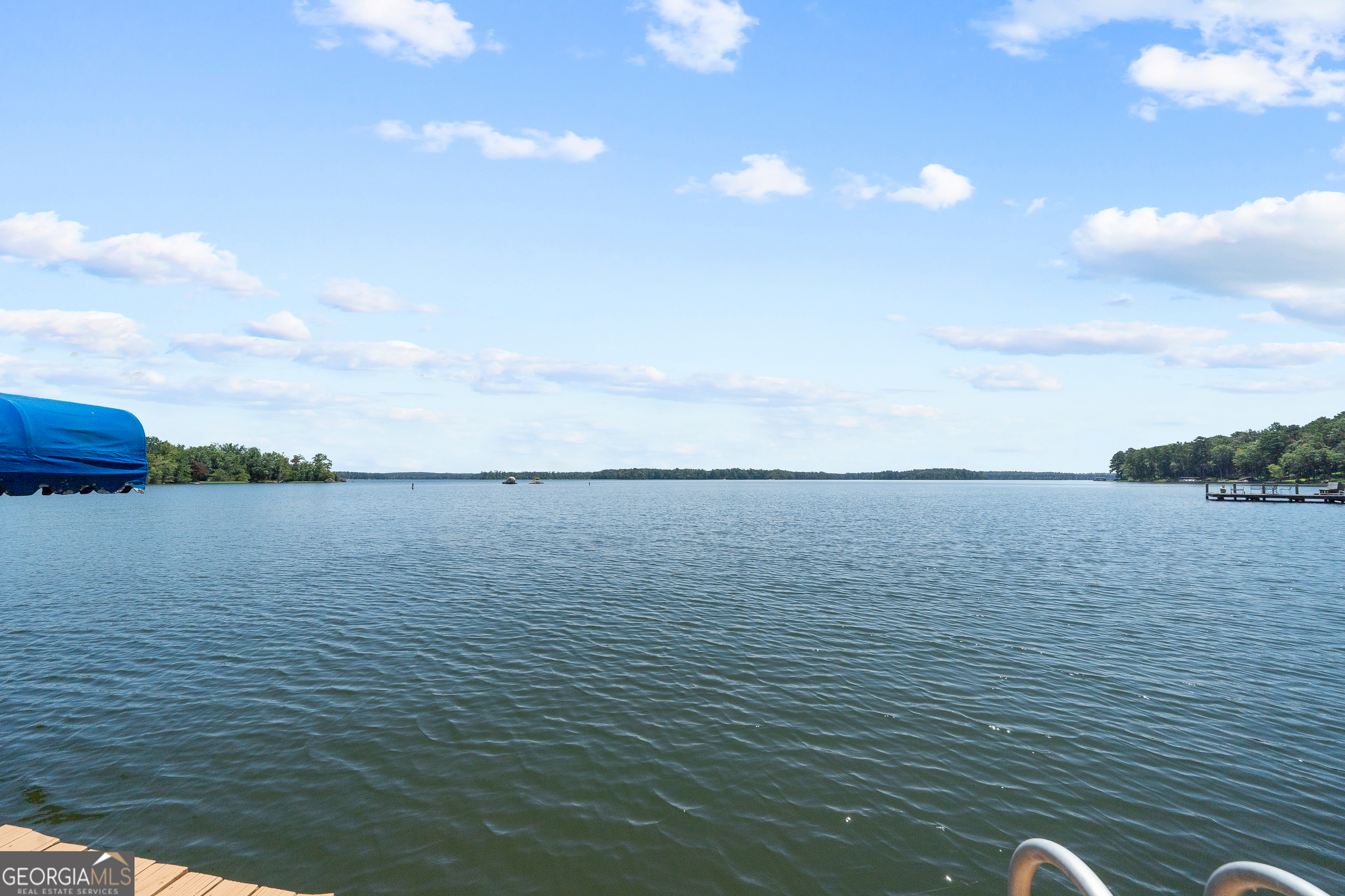 264 Winding River Road Eatonton, GA 31024 - Photo 65 of 72 a view of a lake view