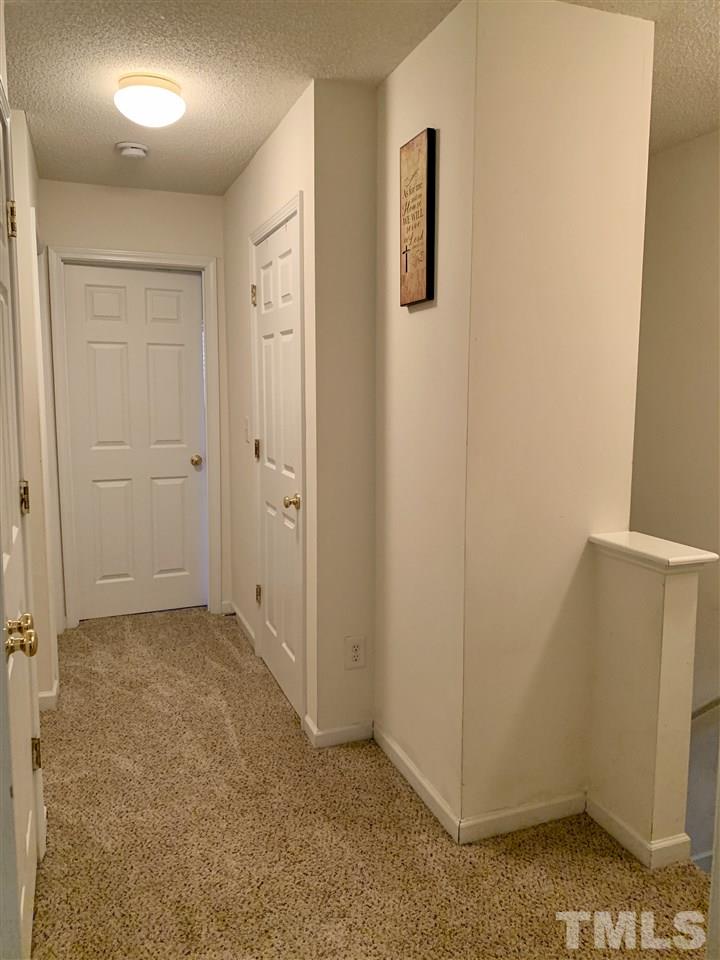 506 Huron Road Raleigh, NC 27610 - Photo 19 of 29 an empty room with windows
