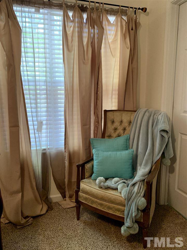 506 Huron Road Raleigh, NC 27610 - Photo 21 of 29 a living room with furniture and a window