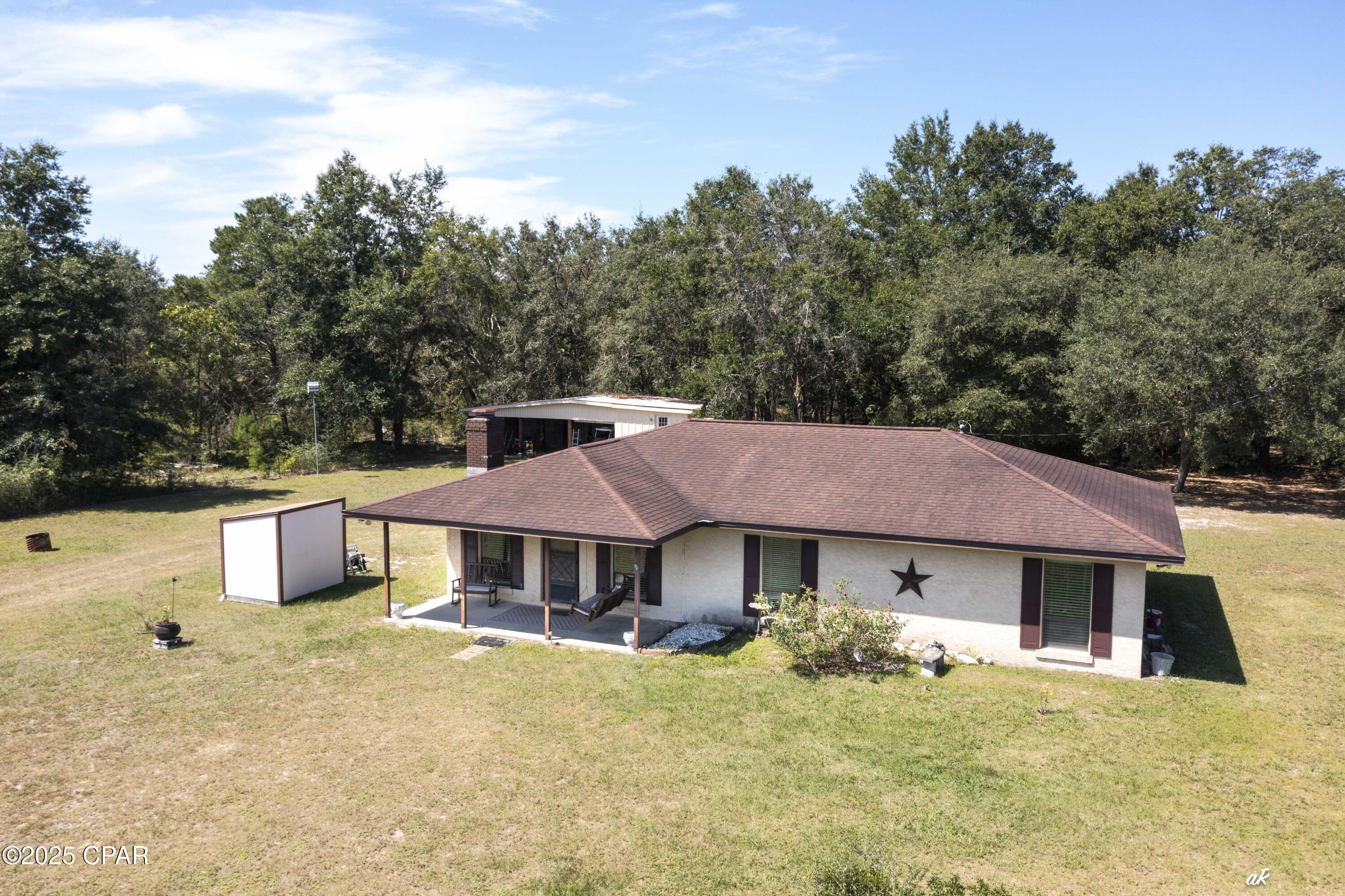 12835 Farm Road Southport, FL 32409 - Photo 2 of 31