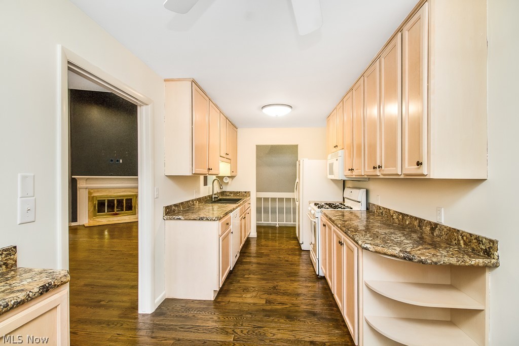 452 Hampton Ridge Drive Akron, OH 44313 - Photo 7 of 25 Expansive countertop space, and tons of storage make for the perfect space to prepare and host gatherings. The end bookshelf make for an excellent cafe bar, or place to store cookbooks.