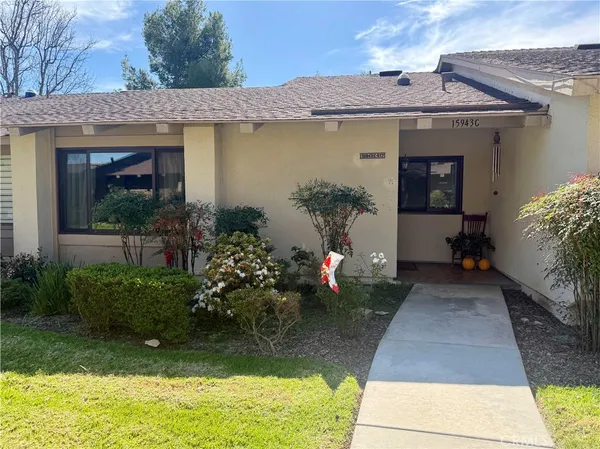 a view of a house with garden